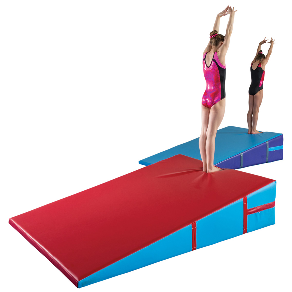 gymnasts practicing on non-folding incline cheese mats