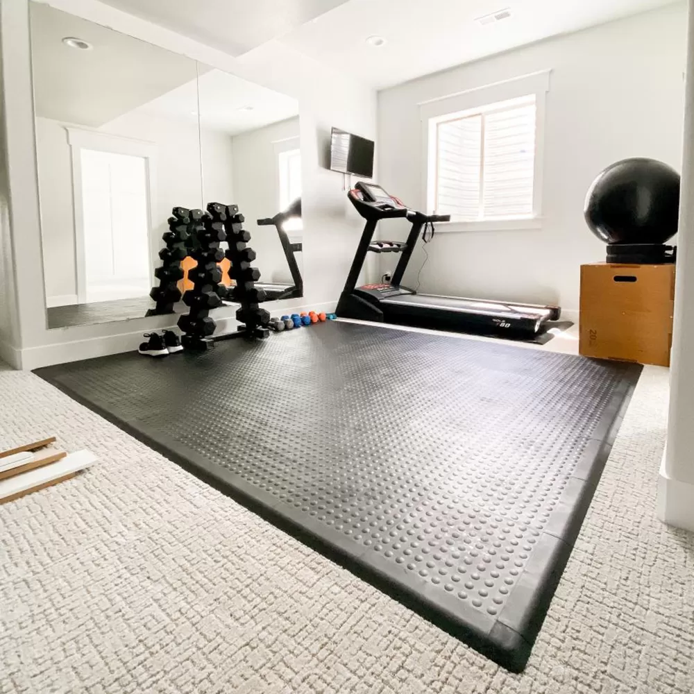 best home gym flooring tiles over carpet 2024