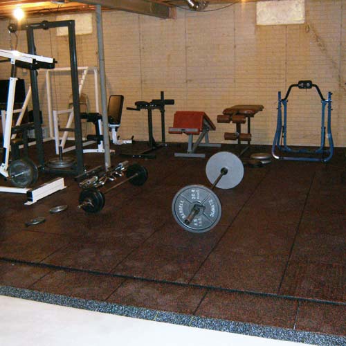 ultratile rubber weight reducers installed in basement home gym