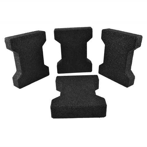 Dog Bone Outdoor Paver Tiles 1-3/4 Inch Black 1 tile laying down three standing.