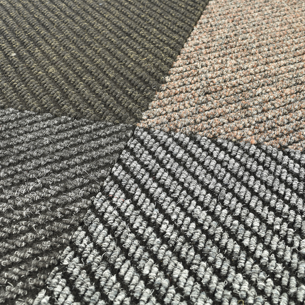 close up of 4 Dominator LP Carpet Tiles