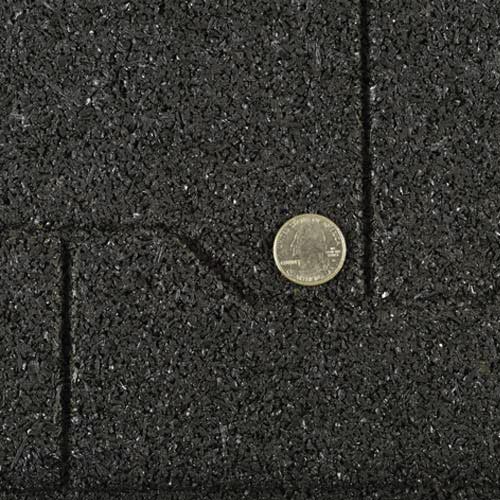 Quarter on surface Equine Paver Tile 2x2 Dog Bone.