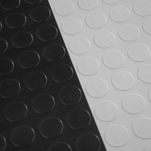 Garage Floor Tile Coin black tile connected with gray tile.