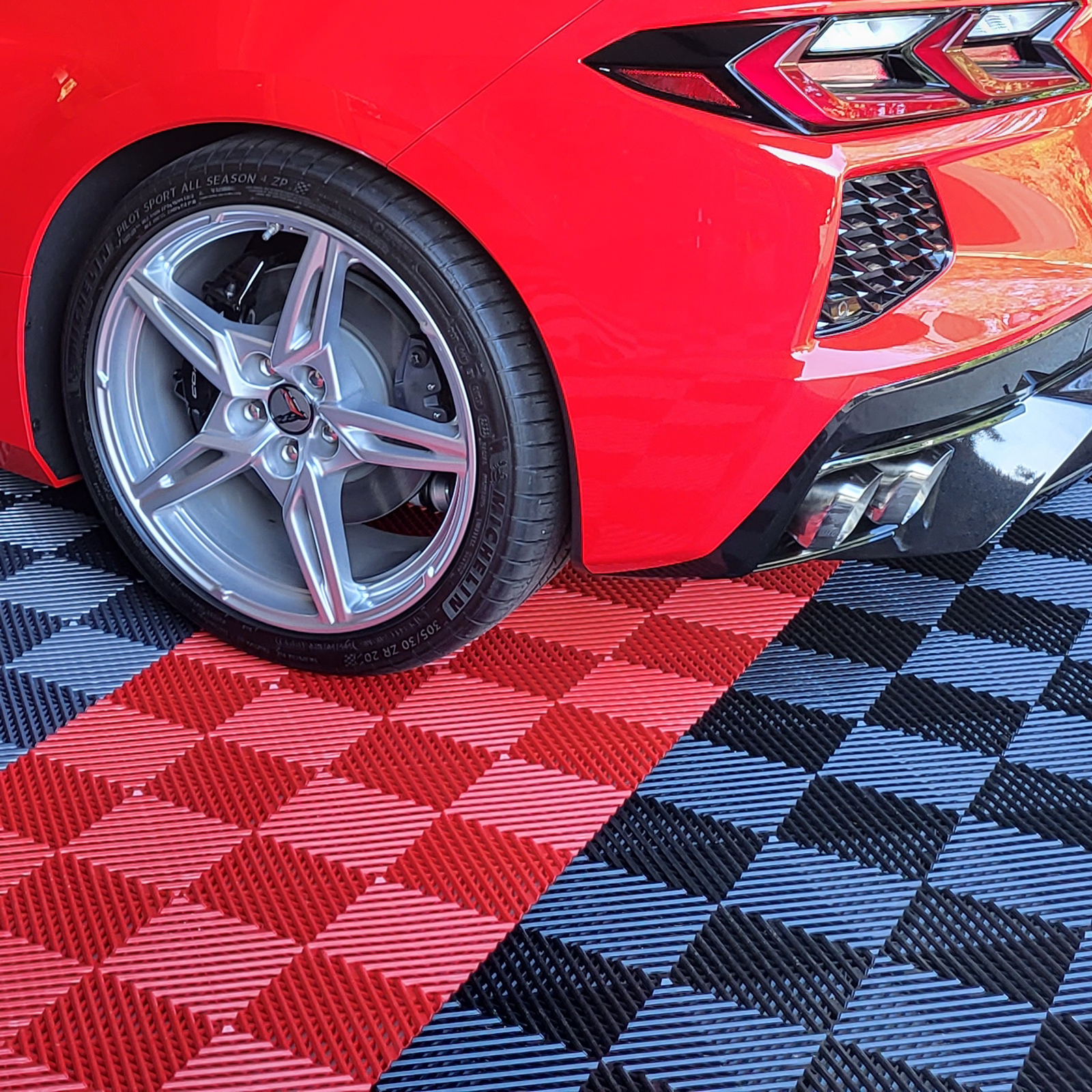 perforated interlocking garage floor tiles with corvette in garage