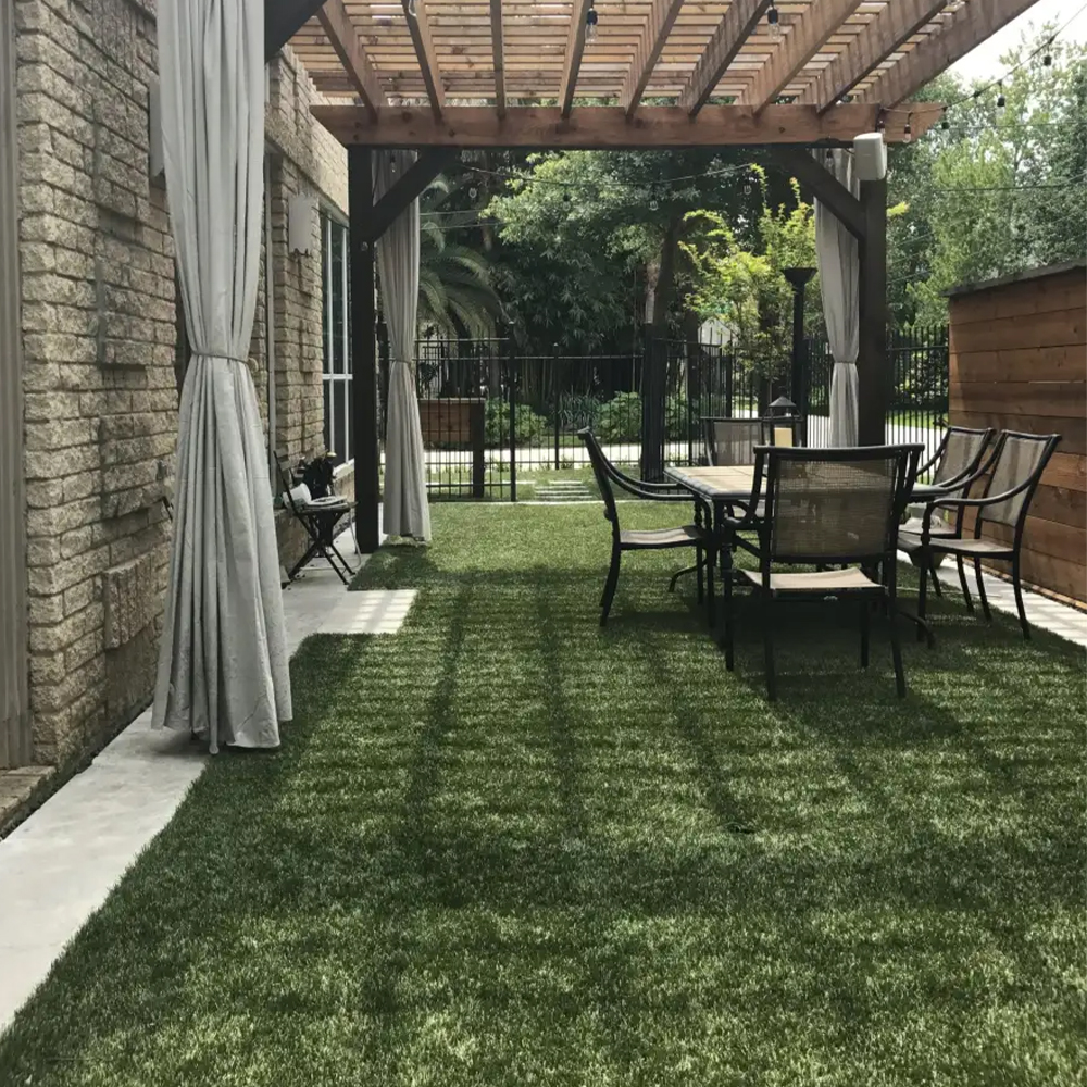 endless summer landscaping turf under pergola with patio furniture