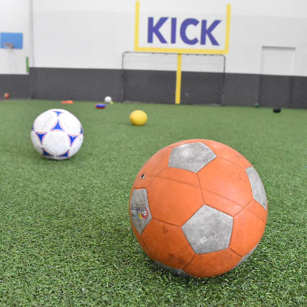 soccer ball on indoor turf closeup
