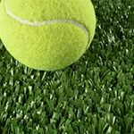 close up of tennis court artificial turf with tennis ball