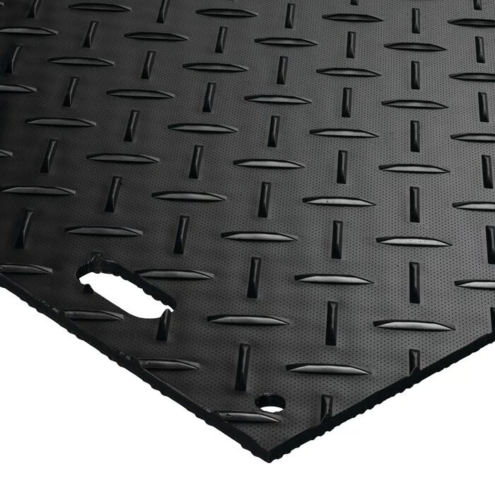MambaMat Ground Protection Mat Black 1/2 Inch x 3x8 Ft. close up with hand holes. 
