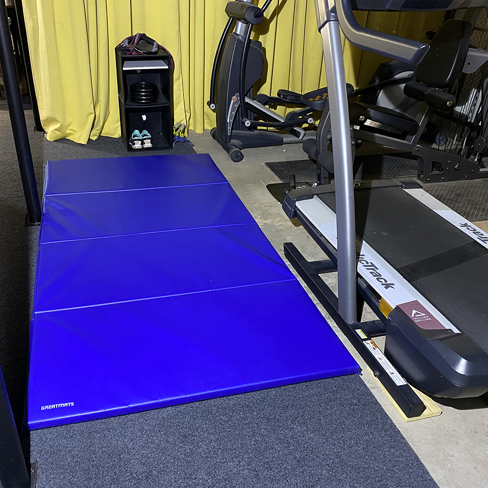 folding gym workout mats in basement gym