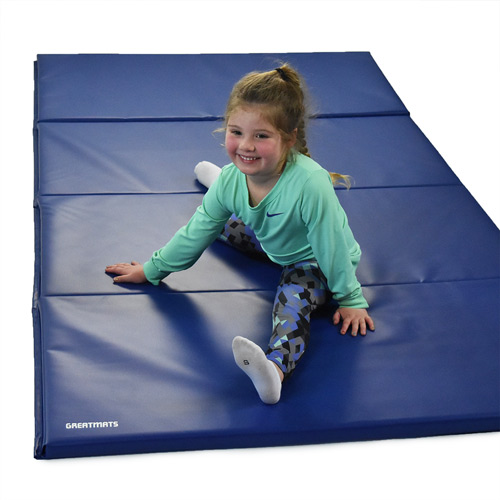 Gym Mats for Sale Tumbling 4x8 Ft x 1.5 inch showing splits and smile.