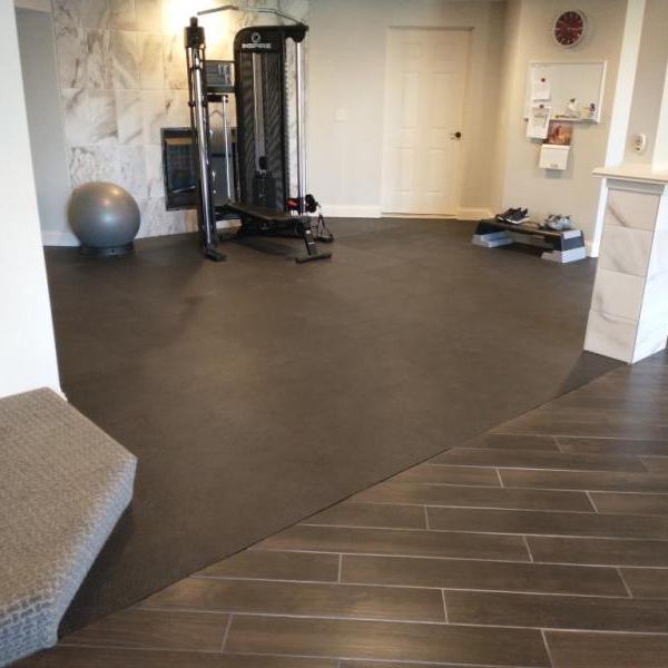 home gym pebble floor tiles in basement home gym
