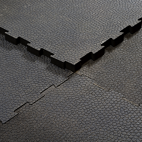 close up of rubber horse interlocking stall mats corners interlocked