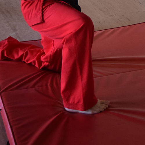 Feet on Red Martial Arts Crash Mat