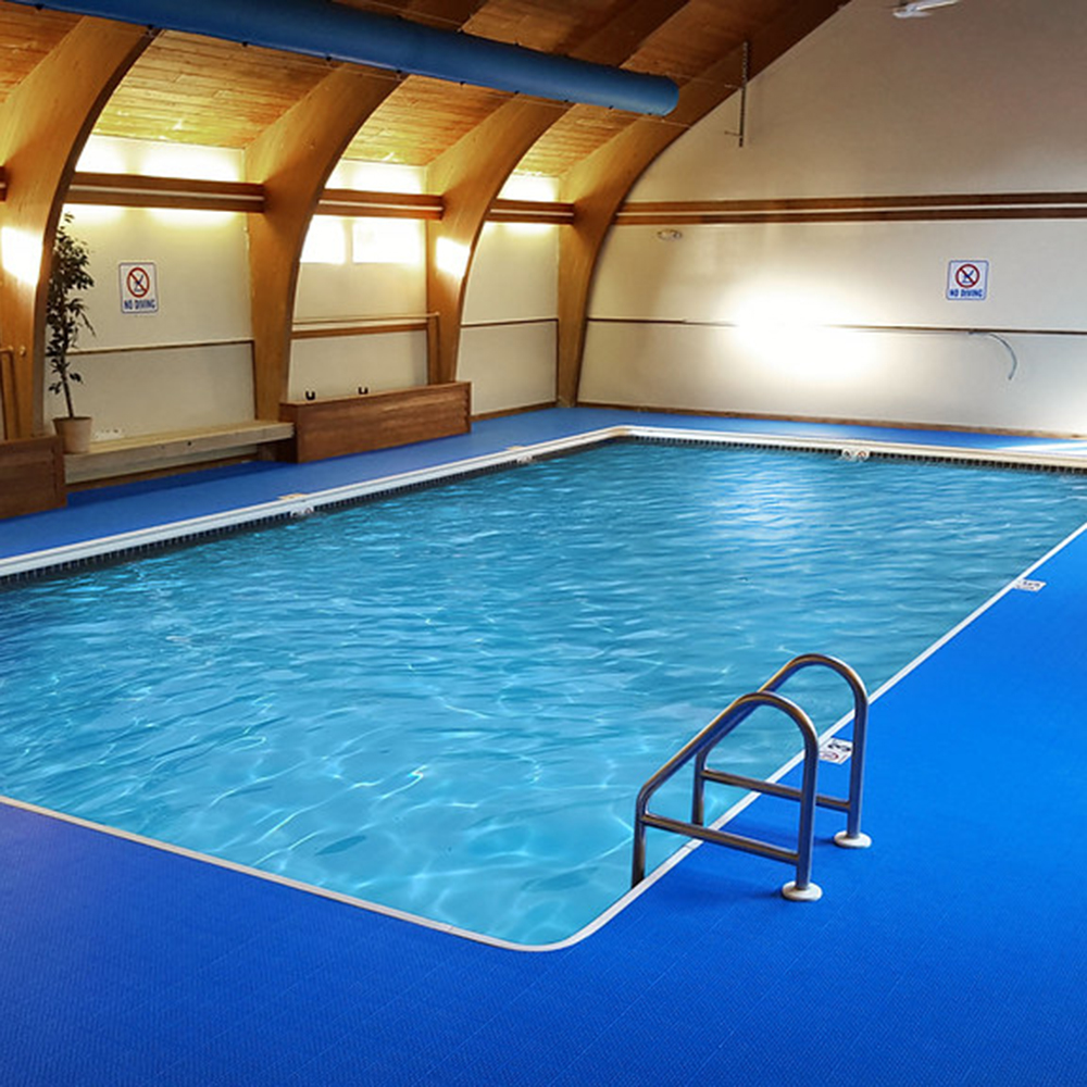 indoor pool with blue outdoor indoor plastic flooring tiles