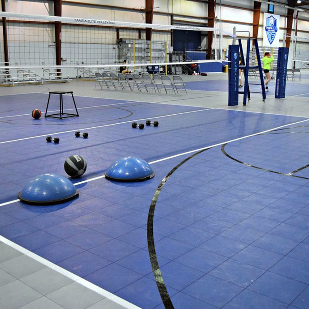Blue and gray Indoor Court Tile Solid Surface 1/2 Inch x 1x1 Ft. set up for volleyball practice