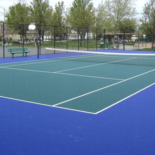 outdoor Tennis Court with blue and green Tile Flooring 