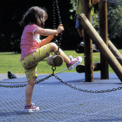 Ergo Matta Perforated - large holes showing girl on playground.