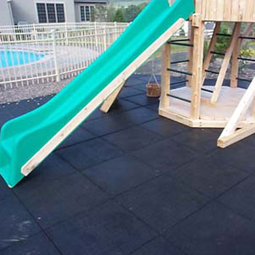 Playground Safety Surface showing green slide.