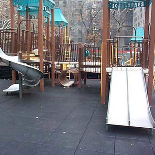 Playground Safety Surface playground with slides.