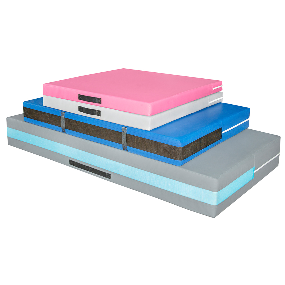 Stack of Safety Landing Mat Non-Folding 4 Inch x 5x10 Ft. In Gray, Royal Blue, Camel and Pink