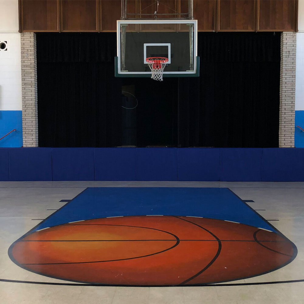 Under basketball hoop in Royal Blue Safety Stage Pads - Hook and Loop Top Return 12-24 Inch W x 48-60 Inch ID