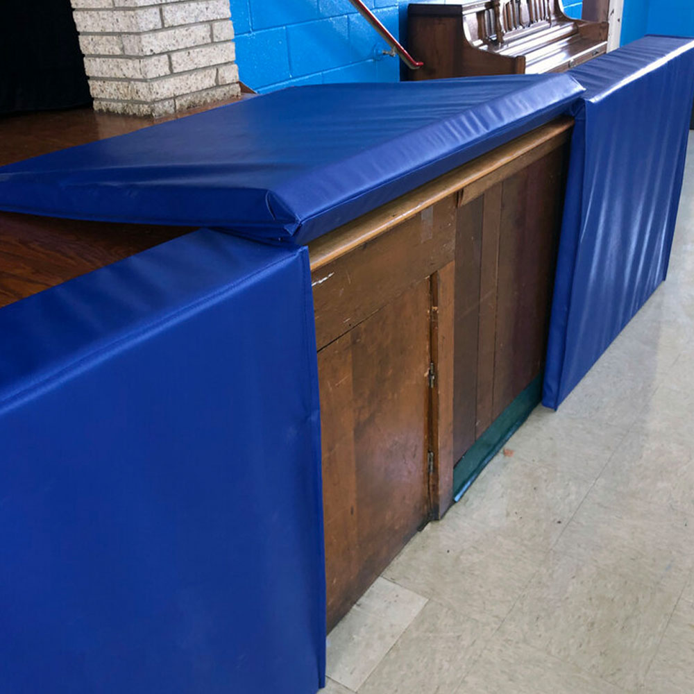 Safety Stage Pads - Hook and Loop Top Return 36-48 in. W x 48 in. ID in royal blue over storage door