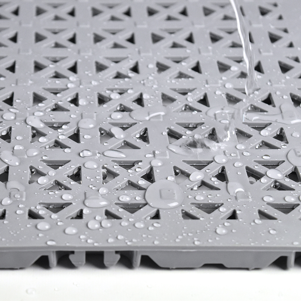 waterproof StayLock Perforated Outdoor tiles showing water on tile 