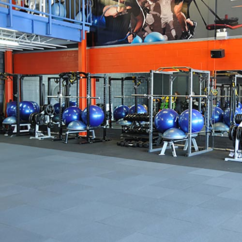 Gray Sterling Athletic Sound Rubber Tile installed in commercial gym