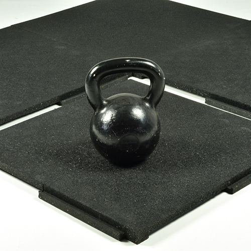 Four tiles with kettlebell on Sterling rubber gym tile 1.25 Inch Black