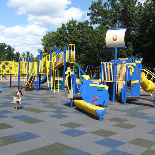 Sterling playground tile 4.25 inch solid colors installed on playground