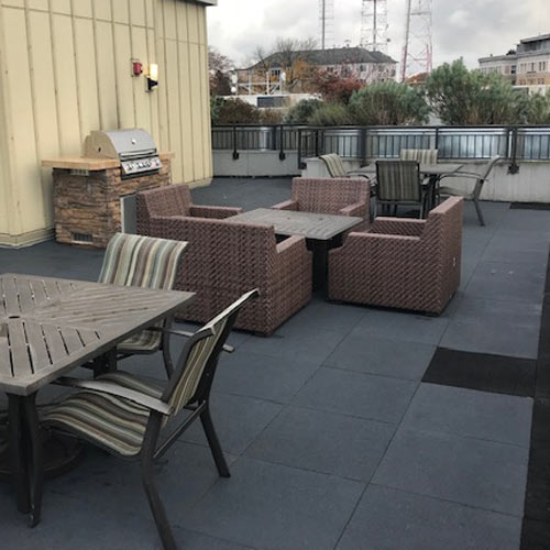 gray and black Sterling Rooftop tiles installed on rooftop deck