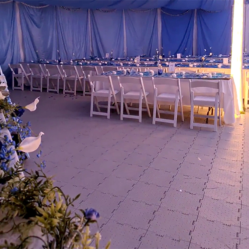 Portable Outdoor Tent Tiles installed over Grass at wedding
