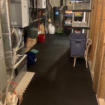 interlocking foam tiles installed in basement utility room