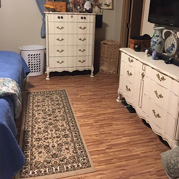 basement bedroom idea with foam floor tiles wood grain