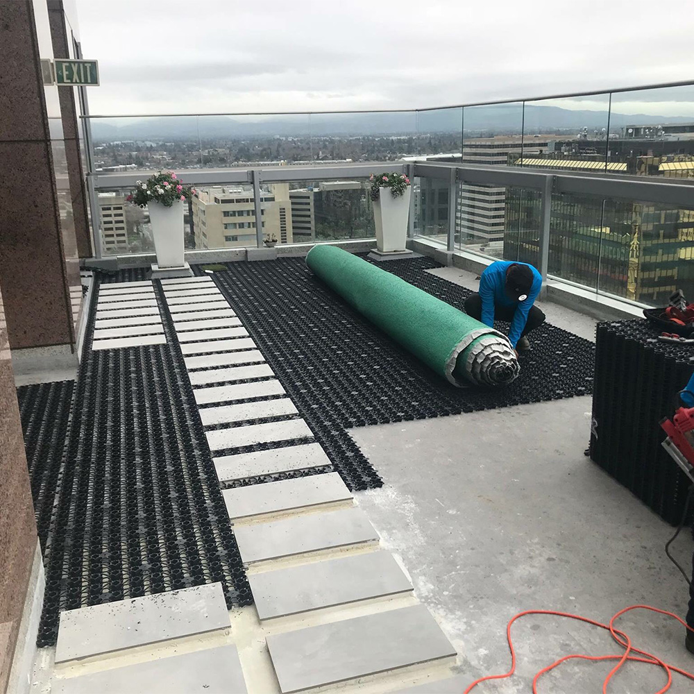 synthetic turf drainage tiles