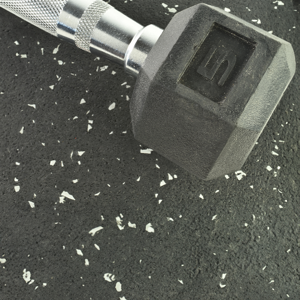 close up of dumbbell on geneva rubber tile