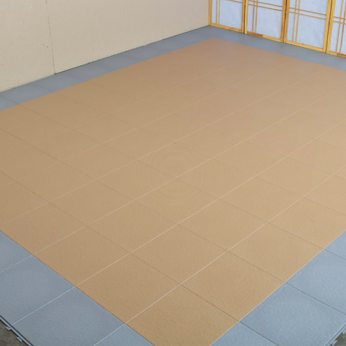 Dry lay interlocking flooring tiles