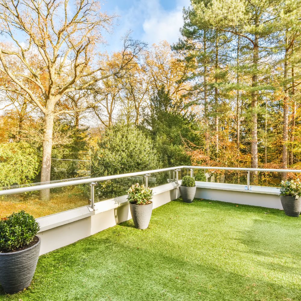 large outdoor deck area with artificial grass