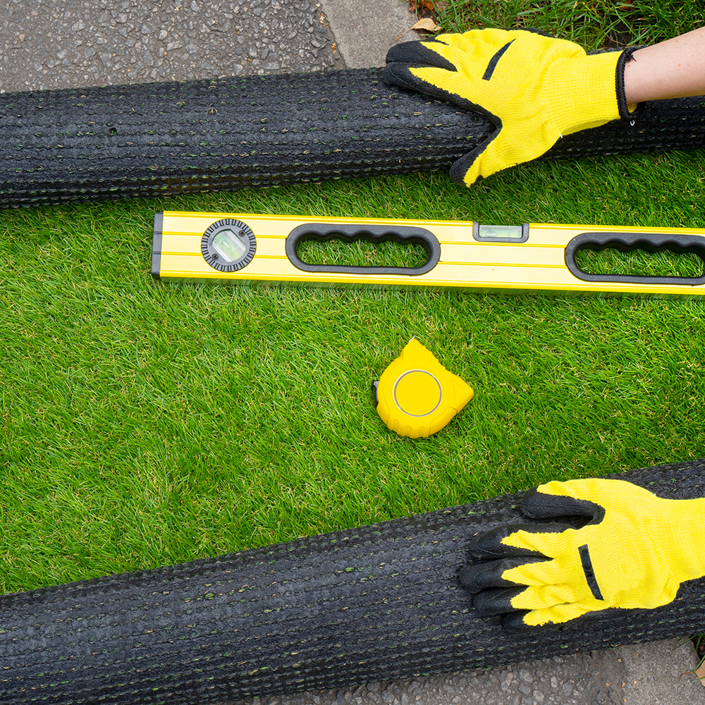 installing artificial grass turf with tools