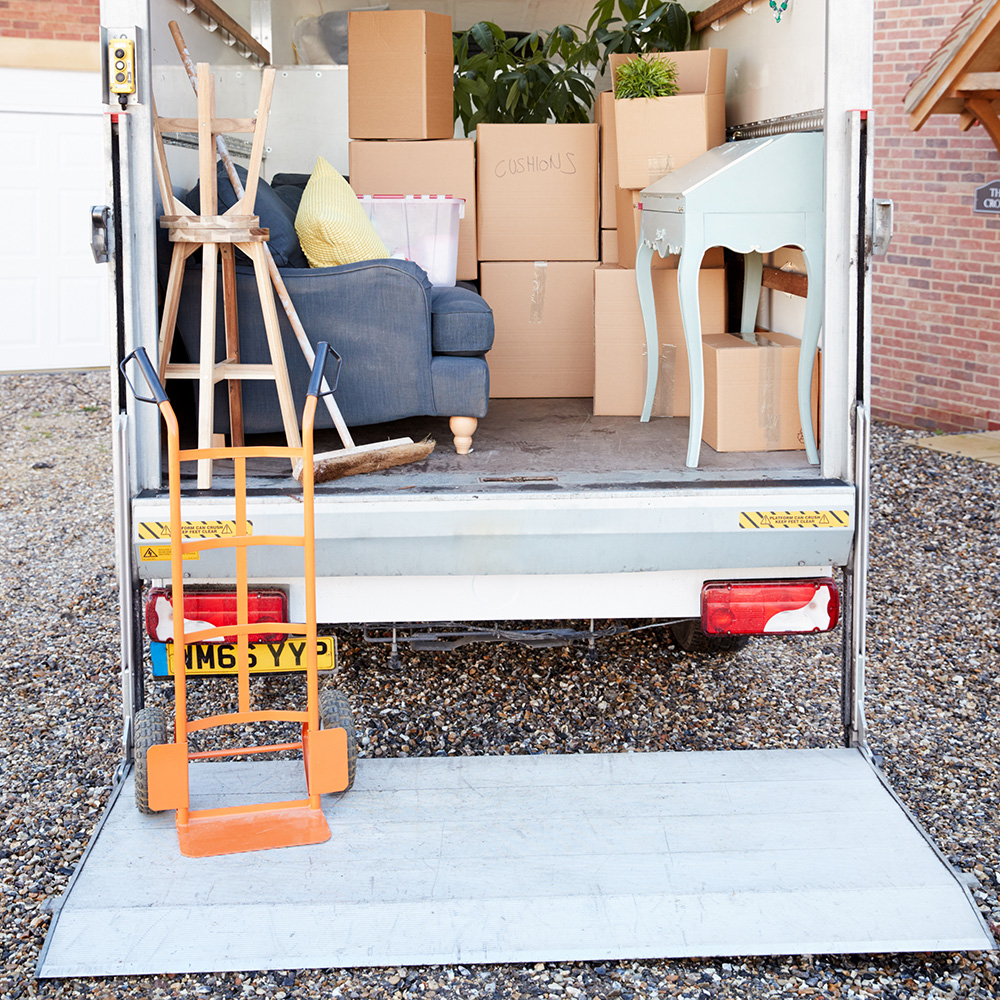 trucks use a lift gate to lower products to street level