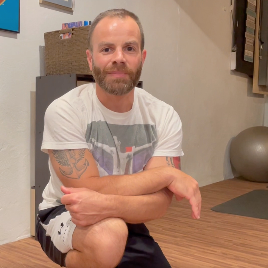 steven in his basement showing wood grain foam floor tiles installation