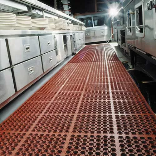 heavy duty red rubber mat in commercial kitchen