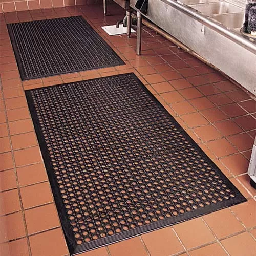 heavy duty black rubber mat in commercial kitchen