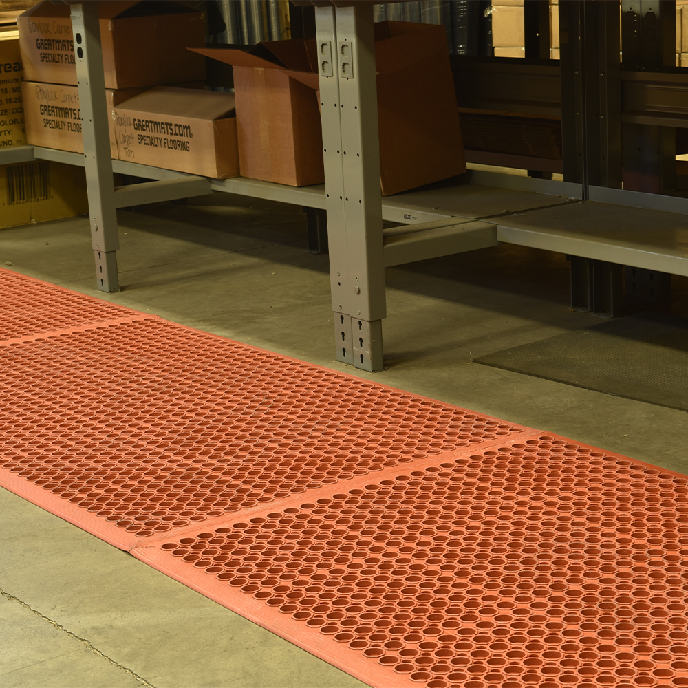 VIP Topdek Senior Red Mat 3 x 14 Feet 8 Inches over concrete next to workshop bench