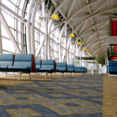 multi-colored with blue carpet tiles in commercial airport