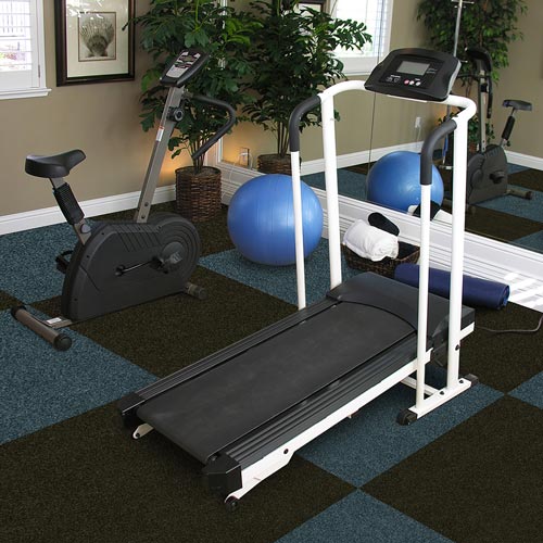 blue and black carpet tiles in a checkboard pattern in a home gym