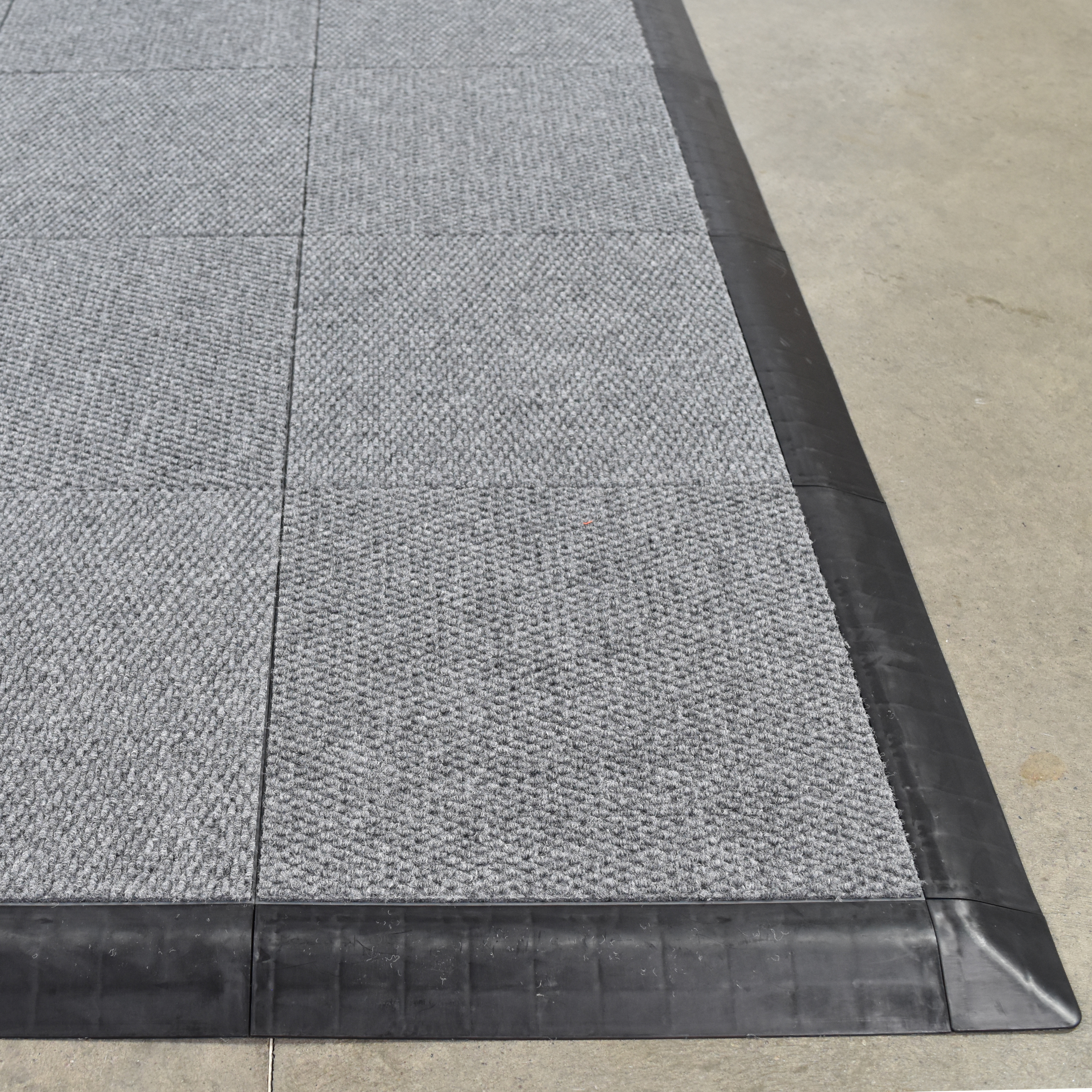 Bat Modular Carpet Tiles With A Raised Lock Together Base