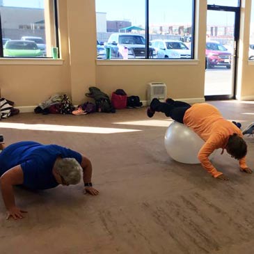 Foam flooring in bodyweight exercise class 