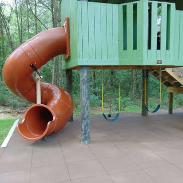 interlocking playground tiles installed on playground