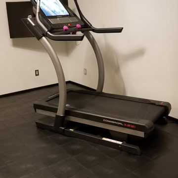 floor tiles with a vapor barrier for basement treadmills